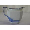 AN AWESOME JAPANESE MADE HAND PAINTED BLUE AND WHITE PORCELAIN MILK JUG