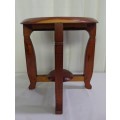 AN AWESOME AND SOLIDLY MADE SOLID TEAK FOUR-LEGGED STOOL IN EXCELLENT CONDITION