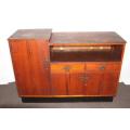 AN AMAZING ANTIQUE ART DECO SIDE SERVER WITH LOADS OF CUPBOARD SPACE AND A TIERED SERVING SURFACE
