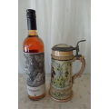A SUPERB AUTHENTIC GERMAN 1/2 LITRE STONEWARE BEER STEIN WITH A DOMED PEWTER LID