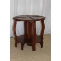 AN AWESOME SOLID TEAK COFFEE TABLE NEST WITH FOUR SMALLER TABLES MAKING A SINGLE LARGER ROUND TABLE