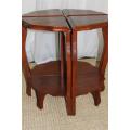AN AWESOME SOLID TEAK COFFEE TABLE NEST WITH FOUR SMALLER TABLES MAKING A SINGLE LARGER ROUND TABLE