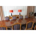 A SPECTACULAR HAND CARVED BURMESE TEAK 10-SEATER DININGROOM SUITE w/ EXTENDING TABLE & CARVER CHAIRS