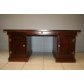 A STUNNING LARGE INDONESIAN TEAK EXECUTIVE "PARTNER" DESK WITH BRASS HANDLES AND HINGES