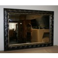 A MAGNIFICENT LARGE WALL MIRROR WITH BEAUTIFUL CARVED DETAILING ACCENTUATED w/ GOLD GILDED DETAILING