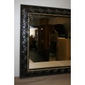 A MAGNIFICENT LARGE WALL MIRROR WITH BEAUTIFUL CARVED DETAILING ACCENTUATED w/ GOLD GILDED DETAILING