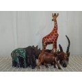 A STUNNING COLLECTION OF SIX WOODEN CARVED ANIMAL FIGURINES INCLUDING A STUNNING PAINTED ELEPHANT