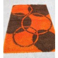 A BEAUTIFUL BOLD "ORANGE AND BLACK" PURE WOOL LONG PILE CARPET IN GREAT CONDITION