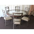 A stunning "All-Weather" patio table with bevelled glass top & 6x chairs with upholstered seats RS17
