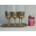AN AWESOME SET OF FIVE BRASS WINE GOBLETS ON A TRAY, WOULD BE PERFECT ON A DINNER TABLE