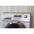 A SUPERB SILVER SAMSUNG (WD-J1255R) ELECTRONIC FRONT LOADER WASHING MACHINE AND TUMBLE DRYER COMBO