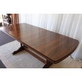 A STUNNING VINTAGE 6 TO 8 SEATER EXTENDABLE DINING TABLE WITH A "HIDDEN" EXTENSION COMPARTMENT