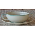 AN EXQUISITE "SUSIE COOPER" VINTAGE ART DECO SOUP BOWL AND SAUCER SET IN THE "WEDDING RING" PATTERN