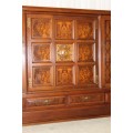 A SUPERB VINTAGE SHOWCASE/ ENTERTAINMENT UNIT WITH INCREDIBLE WALNUT PANELLING AND CARVED ROSETTE