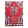 An incredible antique Iranian Persian carpet (1.9m x 1.3m) in red and royal blue colours