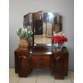 A MAGNIFICENT SOLID IMBUIA TRI-FOLDING MIRROR DRESSING TABLE WITH CUPBOARDS & DRAWERS