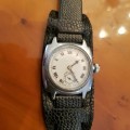 **DISCOUNTED** A VERY RARE ANTIQUE (c1928) "ROLEX OYSTER CUSHION" STAINLESS STEEL GENTS WRIST WATCH