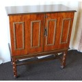 AN AMAZING RETRO (c1970's) WOODEN CABINET ON ITS ORIGINAL CASTORS WITH AWESOME RELIEF DETAILING