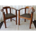 TWO STUNNING ANTIQUE SOLID TEAK CAPTAIN'S CHAIRS WITH PERIOD VINYL SEATS IN GOOD CONDITION bid/chair