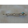 A SPECTACULAR (SOUTH AMERICAN) 900 SILVER LADIES BROOCH WITH A CENTRE TURQUOISE STONE