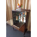 AN EXQUISITE VINTAGE COCKTAIL CABINET WITH MIRROR INTERIOR AND LOADS OF SPACE INSIDE