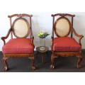 Two beautiful solid Stink Wood Ball & Claw occasional arm chairs with wicker backrests!!! bid/chair
