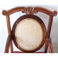 Two beautiful solid Stink Wood Ball & Claw occasional arm chairs with wicker backrests!!! bid/chair