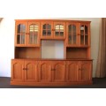 A magnificent large oregon pine cabinet with loads of shelf space and a wine rack