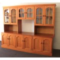 A magnificent large oregon pine cabinet with loads of shelf space and a wine rack