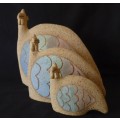 A beautiful set of three stoneware "Guinea fowl" with painted detailing on a "rough" texture