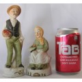 Two wonderful ceramic figurines of an a farmer and his wife with hand painted detailing bid/figurine