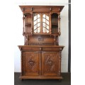 A magnificent antique french renaissance revival oak "buffet-a-deux corpus" cabinet