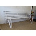 A stunning and sturdy 3-seater wooden outdoor bench with a soluid metal frame in great condition