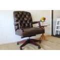 An amazing leather Chippendale style Executives (tilt and swivel) office chair in great condition!!!