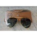 A wonderful pair of vintage authentic Ray Ban aviators in original brown pouch in good condition