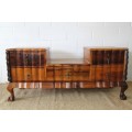 A fabulous, elegant and solid stinkwood ball & claw dresser with five drawers and carved trimmings