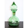 An exquisite Italian made "green glass" Persian style liqueur decanter with a cork base stopper