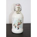 An awesome vintage German "Rauchenfelser Steinbier" porcelain Xmas commemorative flip-top decanter