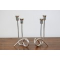 Two beautiful "modern" styled silver plated candle holders with an elegant design - bid/holder