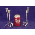 Two beautiful "modern" styled silver plated candle holders with an elegant design - bid/holder