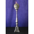 An incredible large and heavy pewter candle holder with stunning and ornate engraved detailing