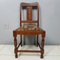 A beautiful and newly upholstered antique Edwardian occasional chair with beautiful turned legs