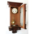 A spectacular antique (c.1890) German regulatory pendulum wall clock with a porcelain clock face