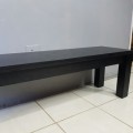 A fabulous long (1.6m) Ebony stained bench - perfect in front of a bed or alongside a dining table
