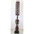 An exquisite and unusual "tall" hand carved wooden african tribal art figurine