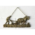 A fantastic solid brass ornate key holder with five hooks and a chain to hang on a wall