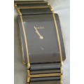 A superb gents Swiss made Rado "DiaStar" black ceramic & gold quartz watch with date display