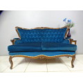 Two magnificent hand carved Victorian sofa's with deep button detailing and padded armrest. Bid/sofa