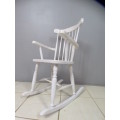 An exquisite white painted rocking chair - gorgeous in a baby room or on a patio!!!