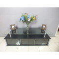 A stunning & very stylish tv stand with place for your entertainment centre and a thick glass top!!